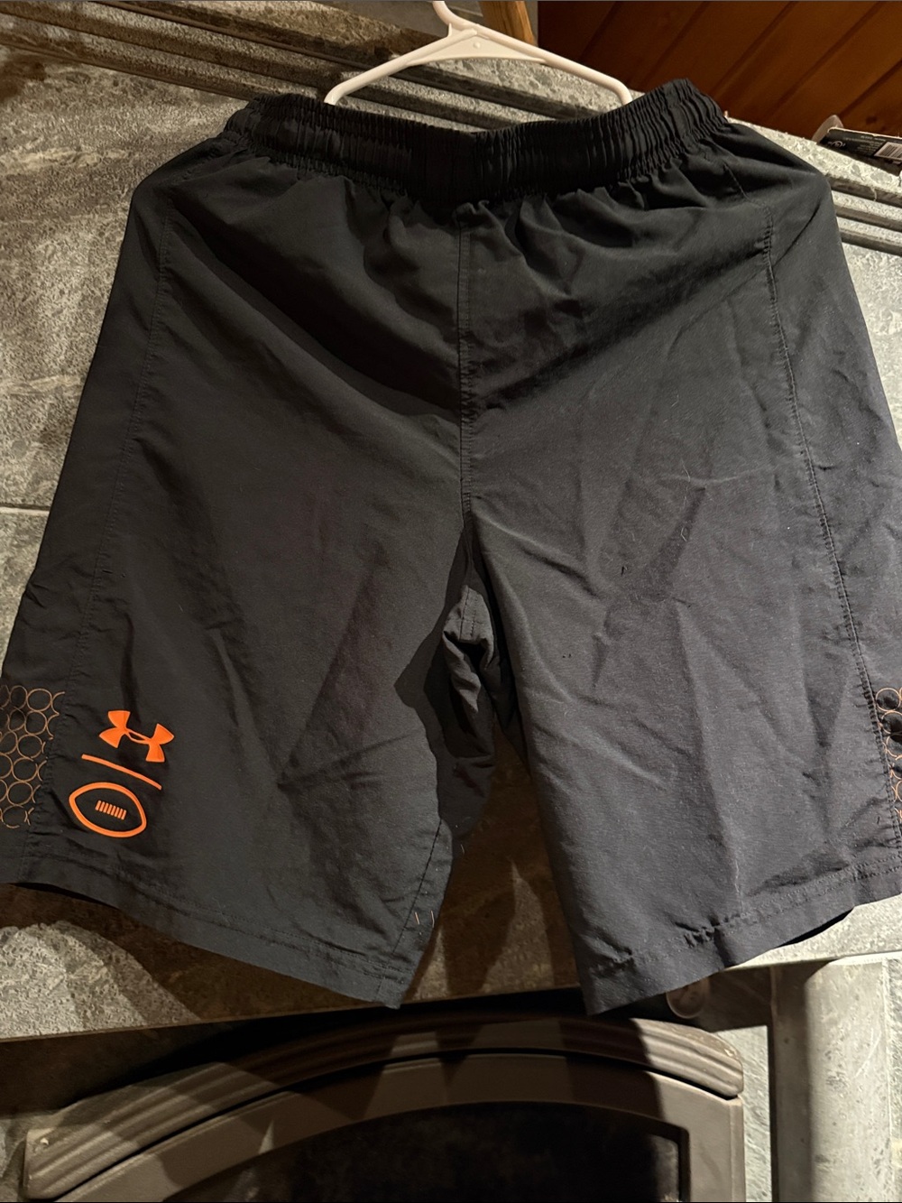 Under Armour Men’s Black Athletic Shorts with Orange Logo Accent